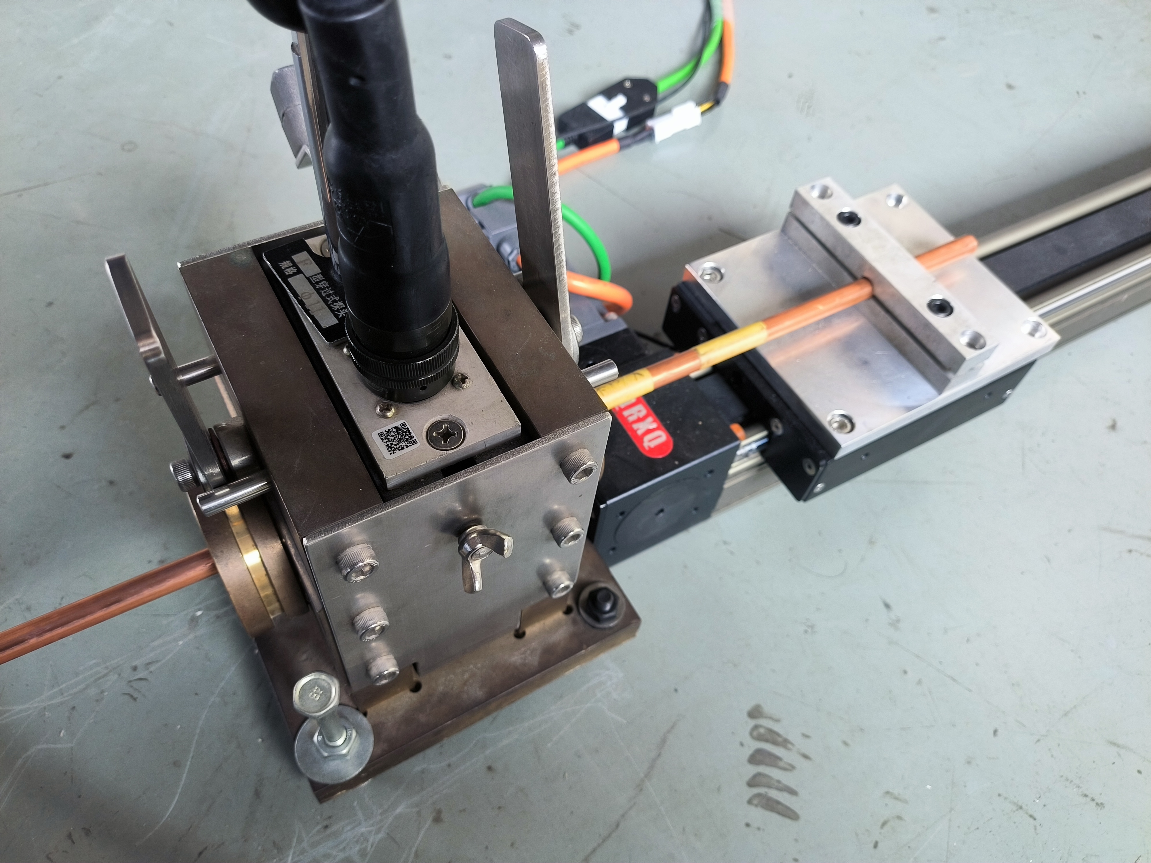 Fig. 4 Through type eddy current testing device